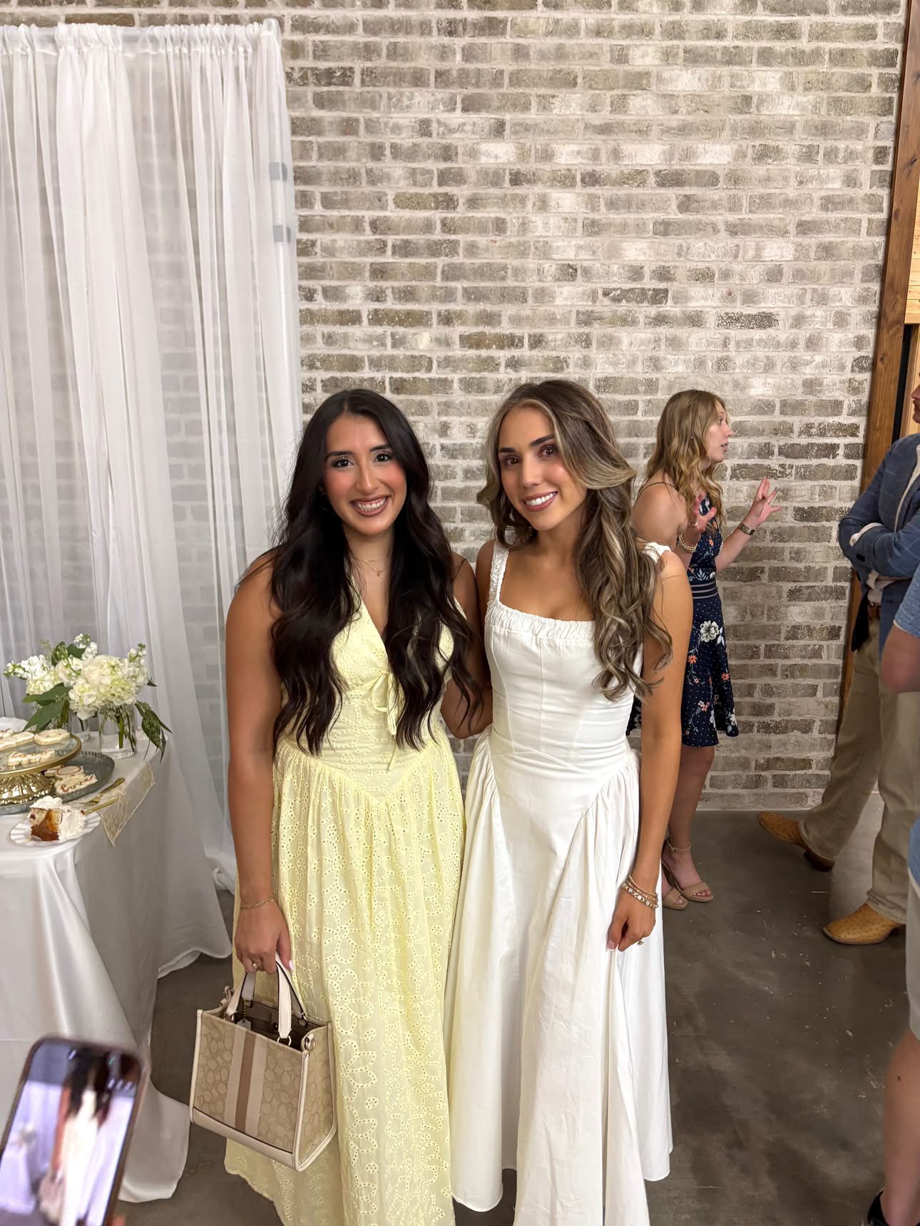 Two clients celebrating with radiant skin